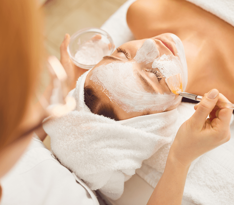 the girl having a facial on the bed